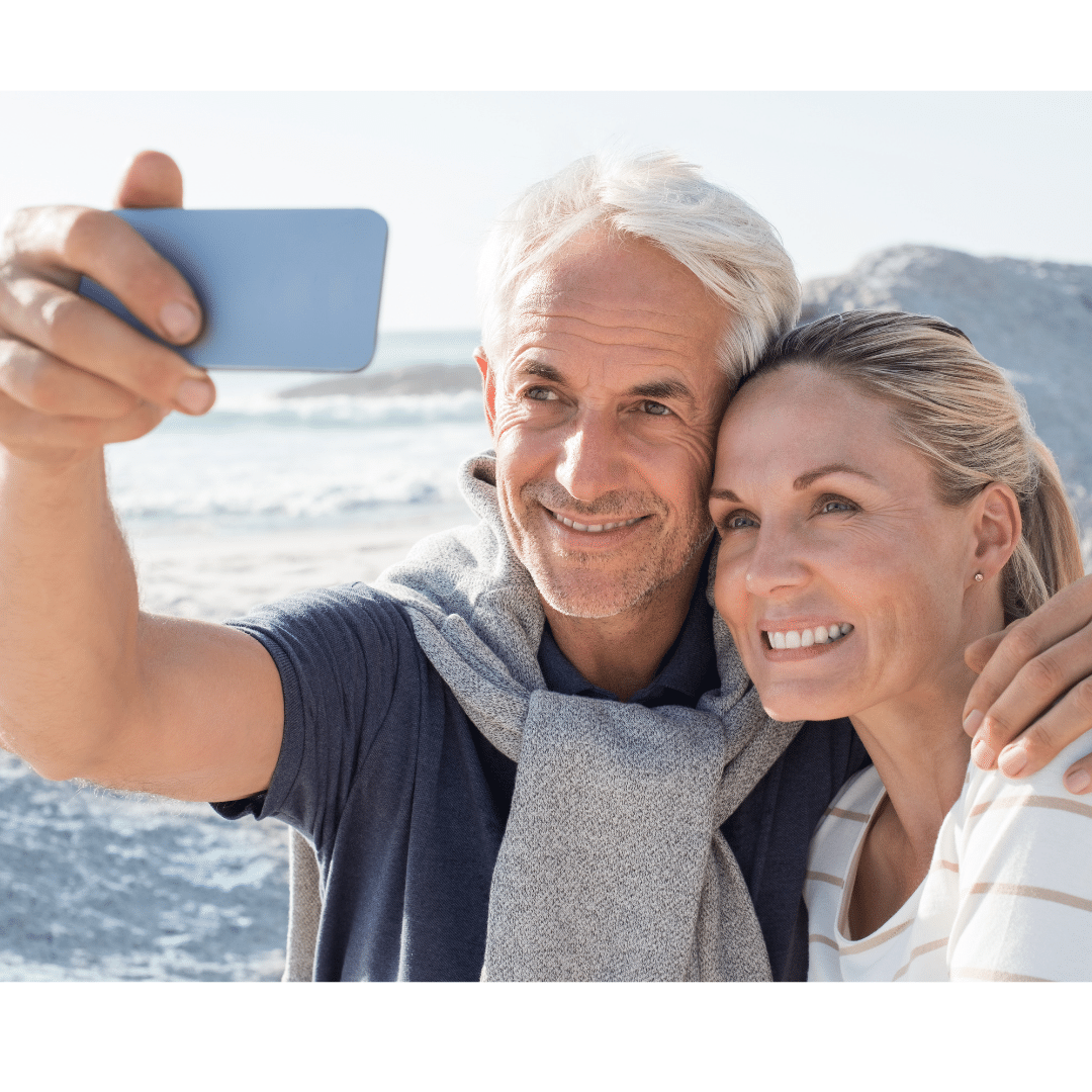 Smiling couple taking a selfie