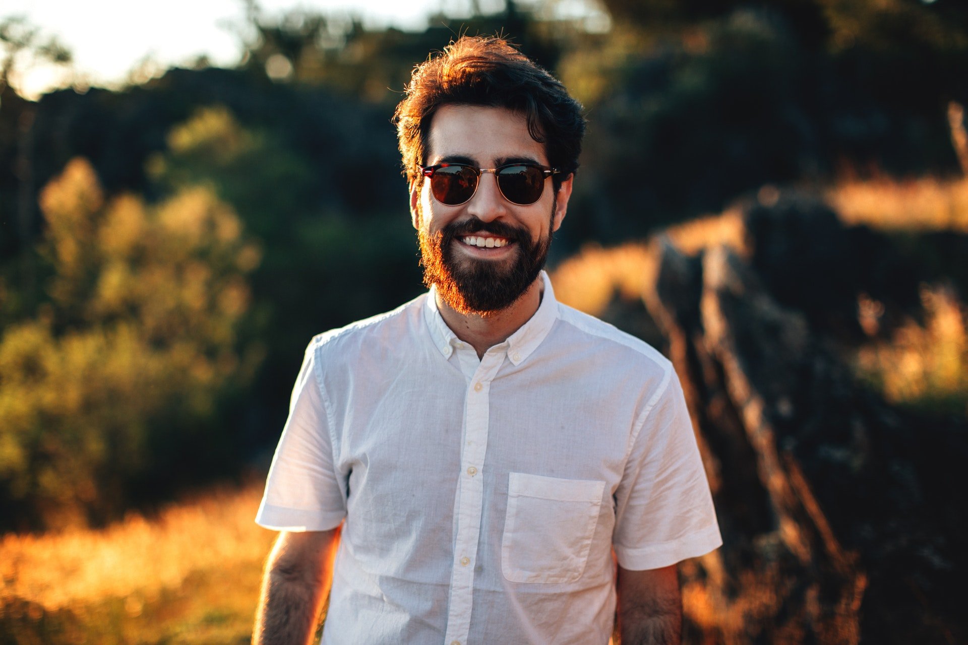 Man smiling in sunglasses